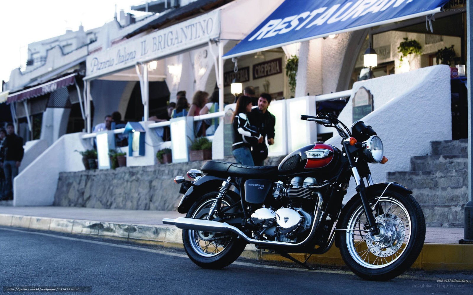 Triumph motorcycle at a seaside restaurant