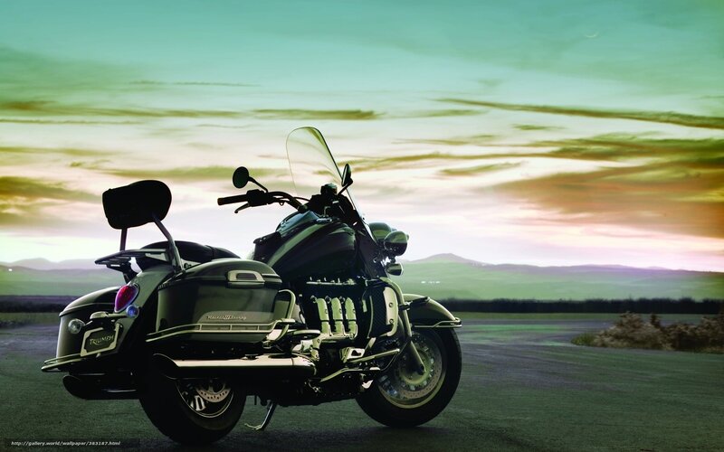 Triumph motorcycle at sunset