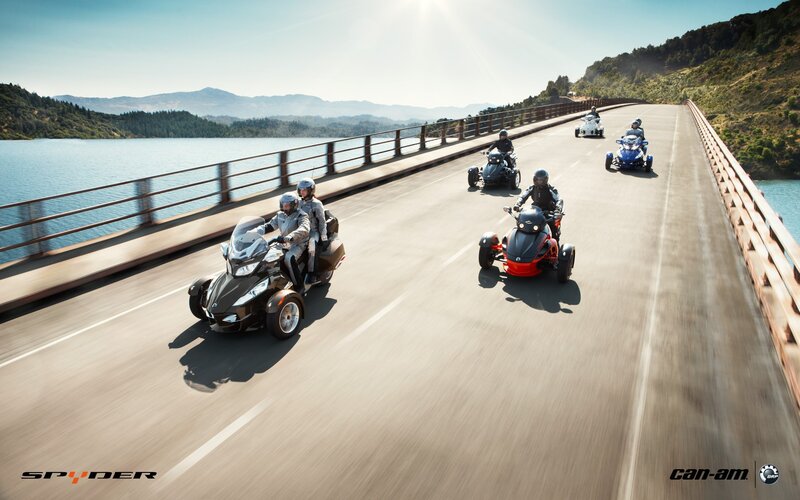 Triumph Spyder on a scenic bridge