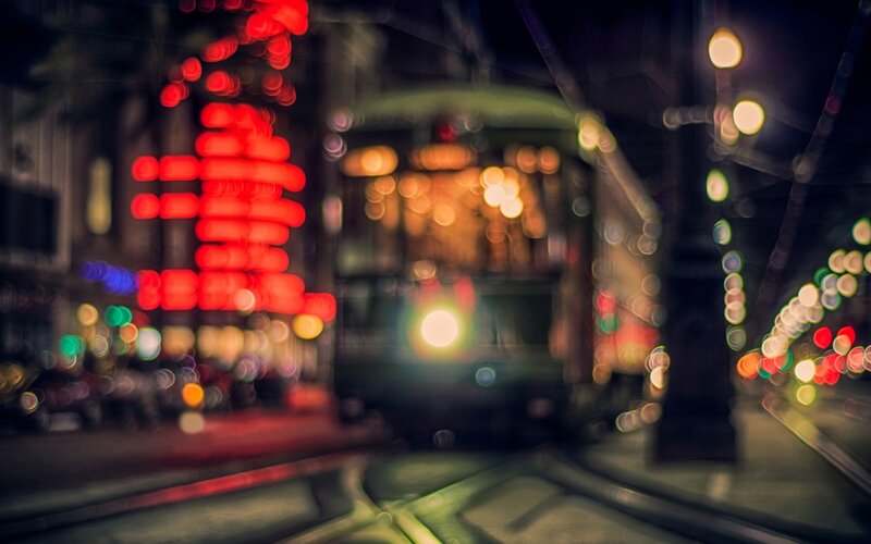 Trolley on City Street — Red
