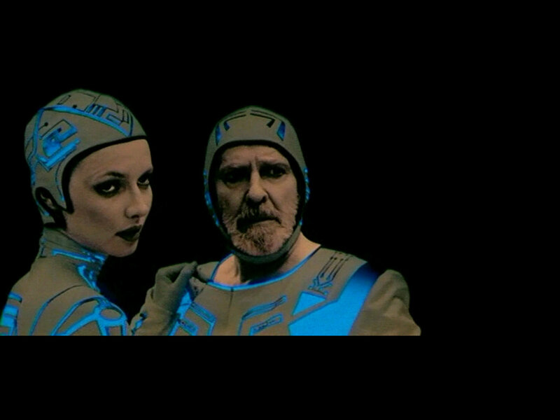 Tron characters in futuristic gear