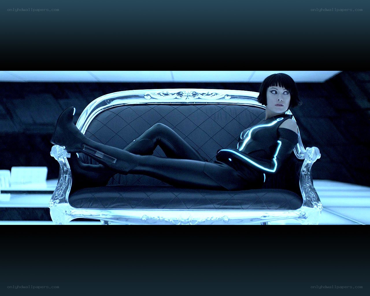 Tron: Legacy character on a couch