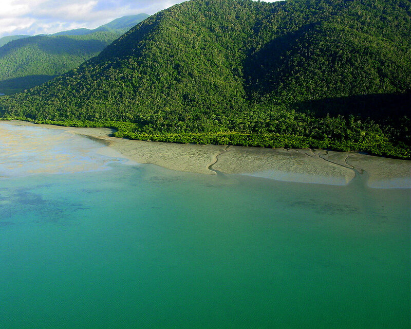 tropical bay with forested hills