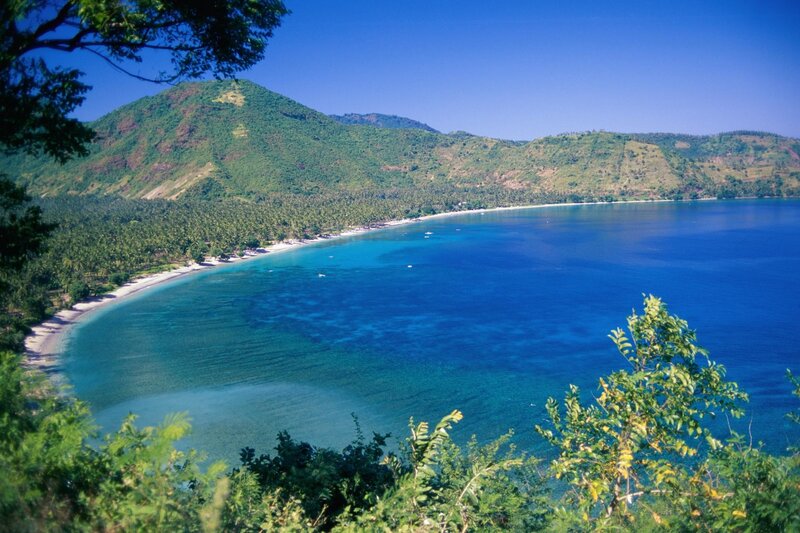 tropical bay with green hills
