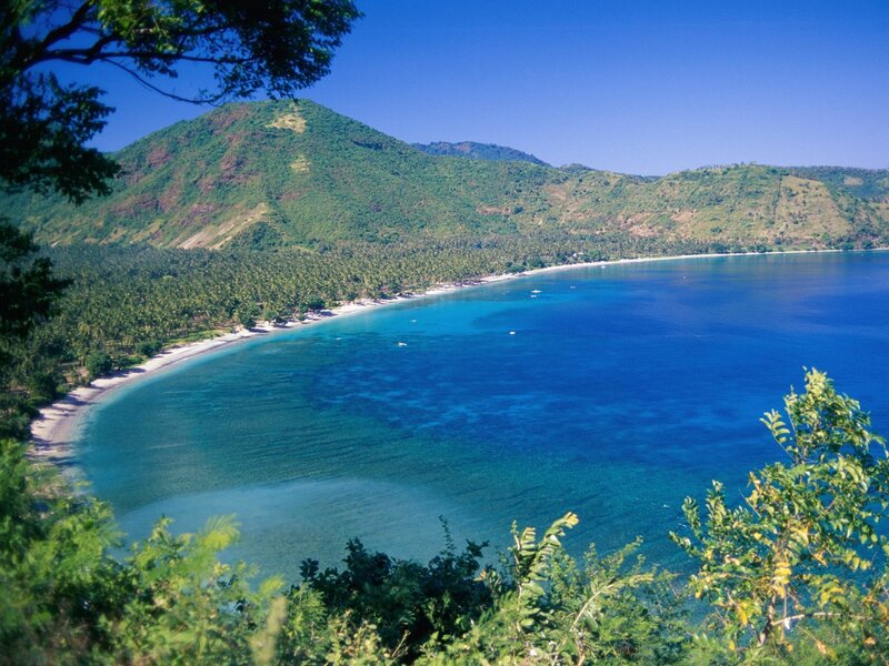 tropical bay with green hills
