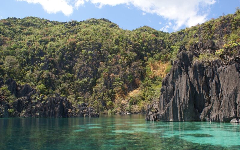 tropical bay with limestone cliffs
