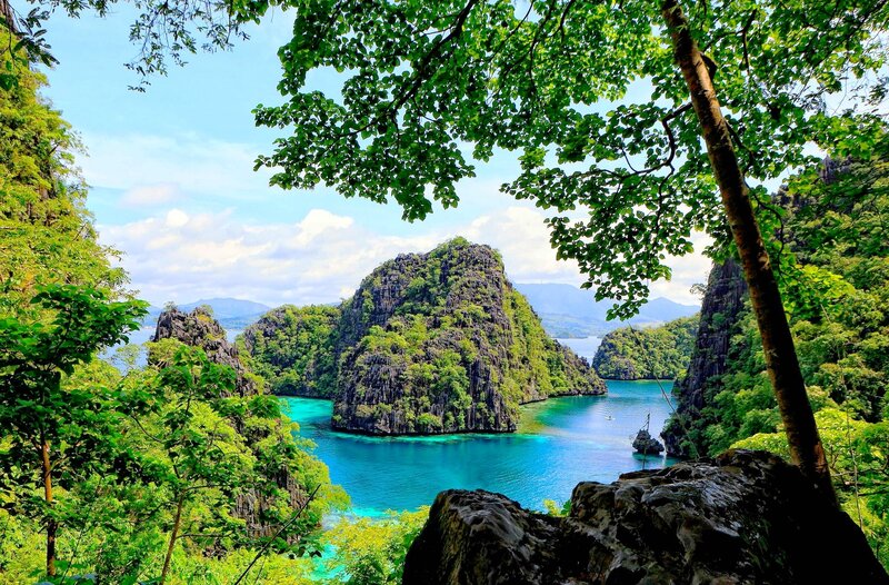 Tropical Bay with Limestone Cliffs — Blue, Serene, Afternoon, Photograph, Limestone Cliffs