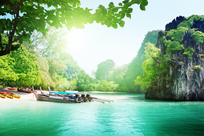 tropical bay with longtail boats