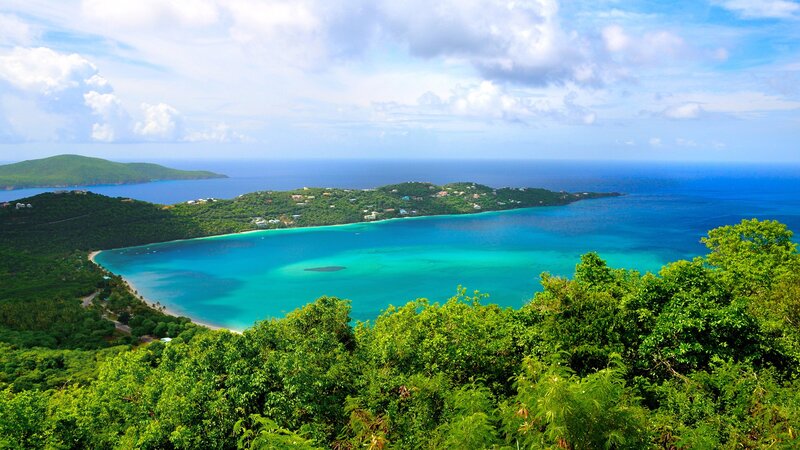 tropical bay with lush green hills