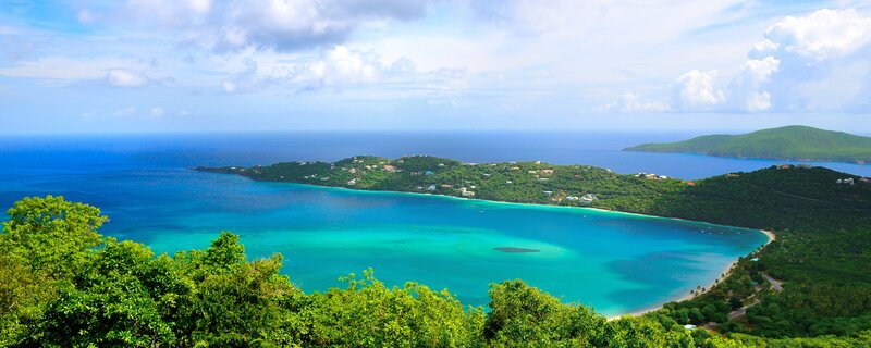tropical bay with lush green hills