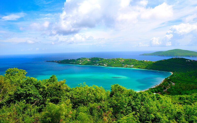tropical bay with lush green hills