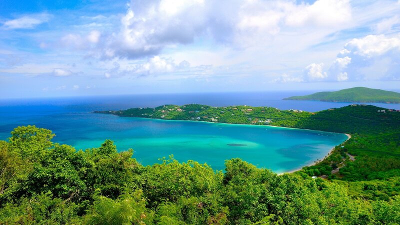 tropical bay with lush green hills
