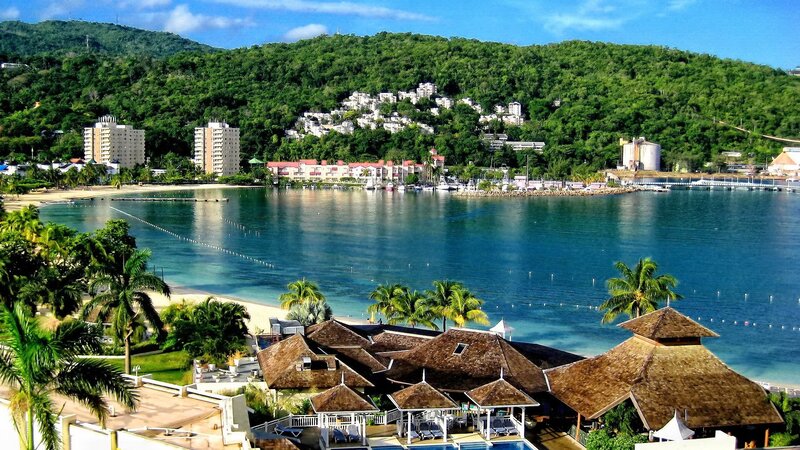Tropical Bay with Resort — Blue