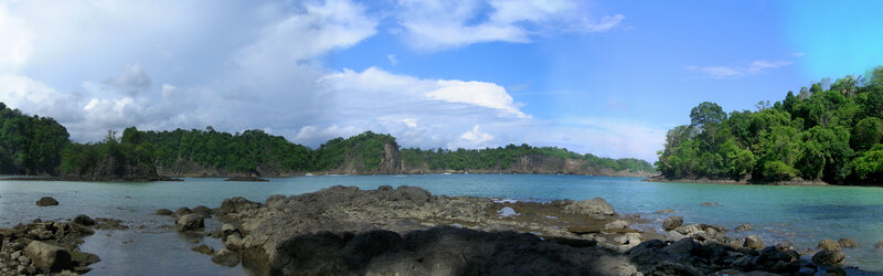 tropical bay with rocky shore