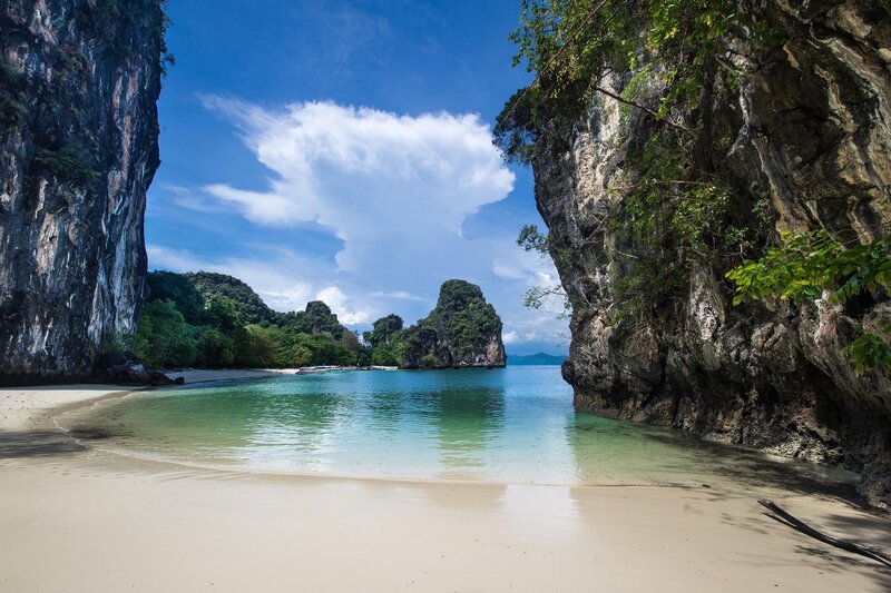 Tropical Beach Cove — Blue, Serene, Afternoon, Photograph, Cliffs, Sea, Trees, Clouds