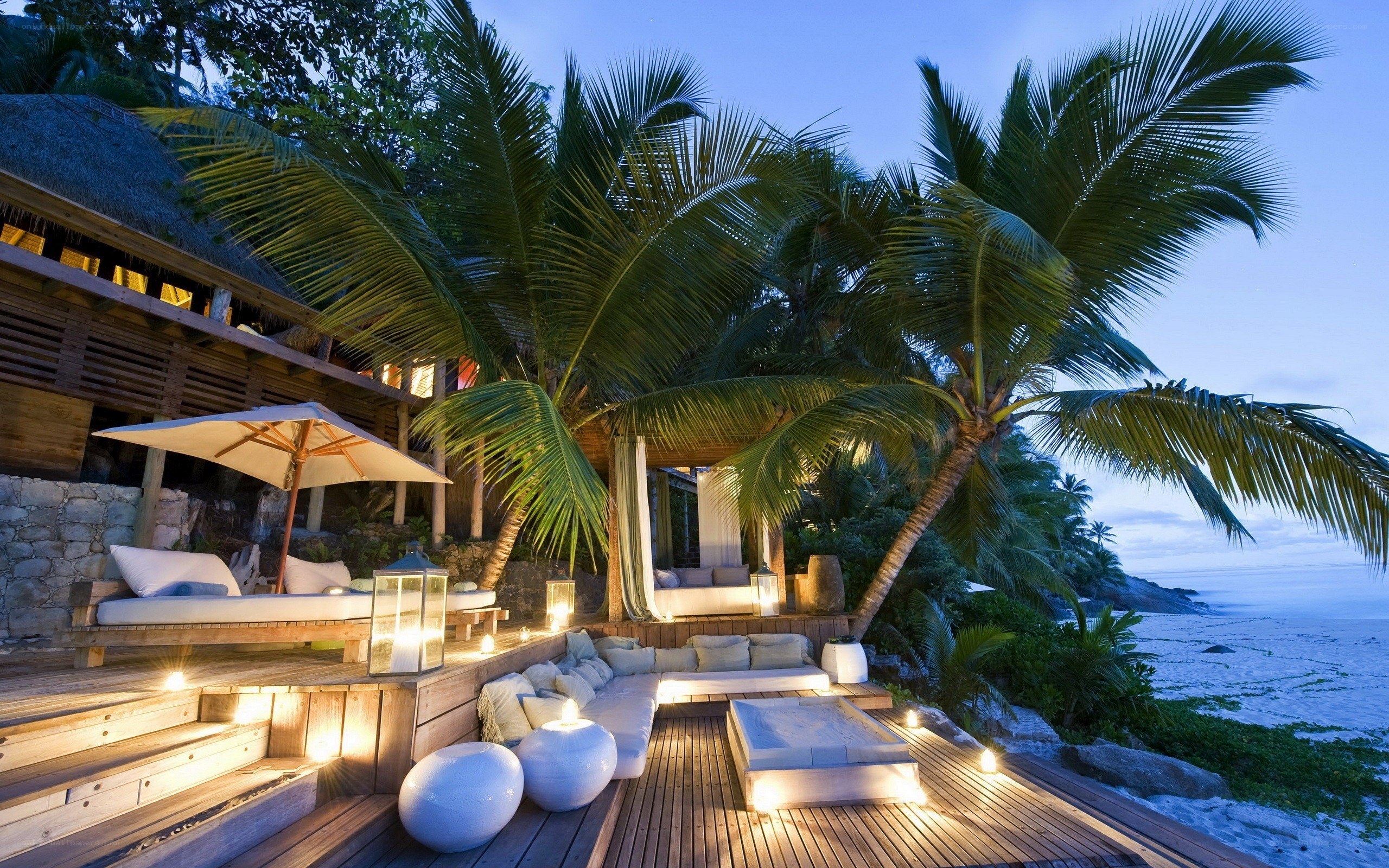 Tropical beach resort at dusk