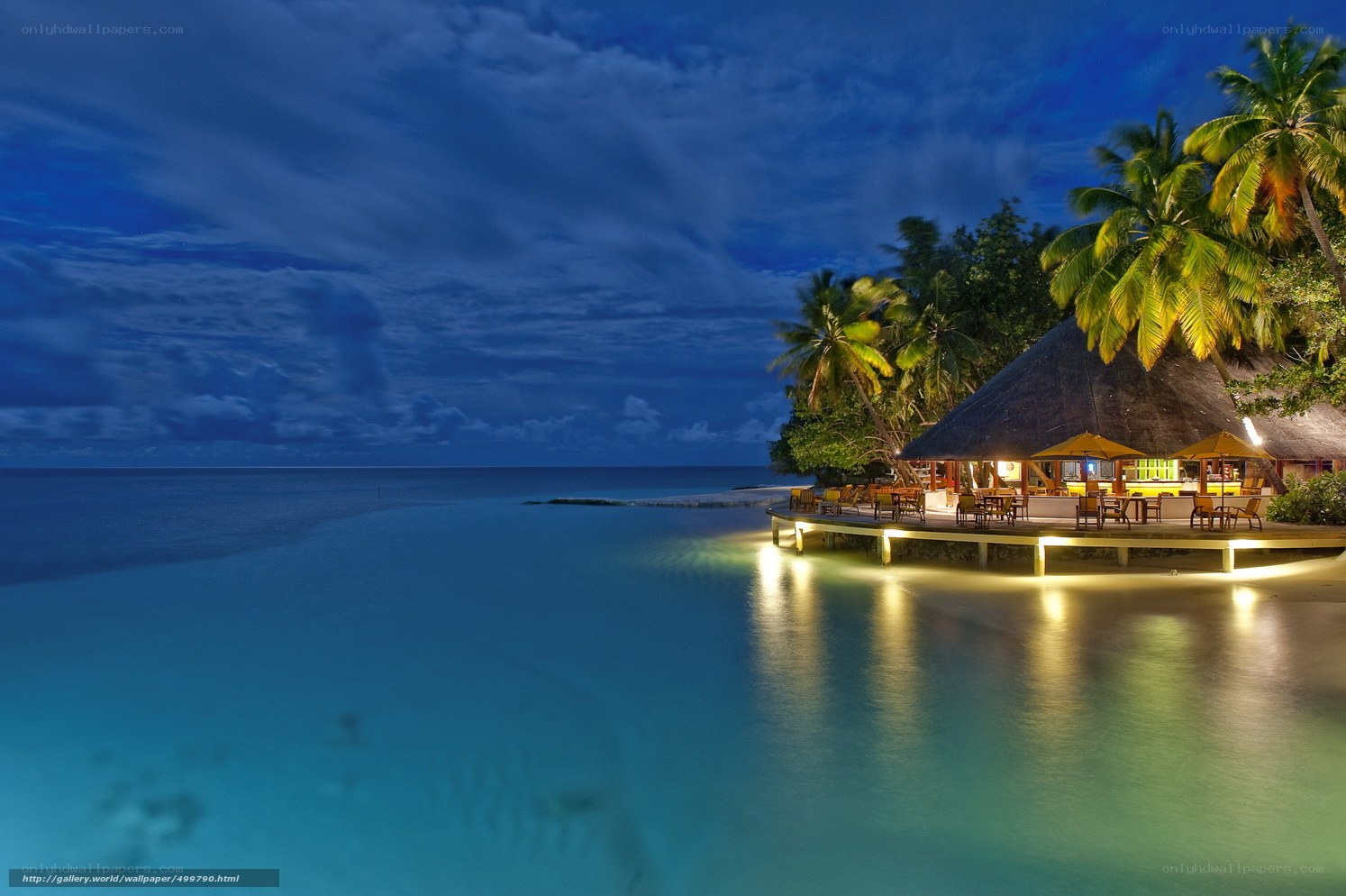 tropical beach resort at night