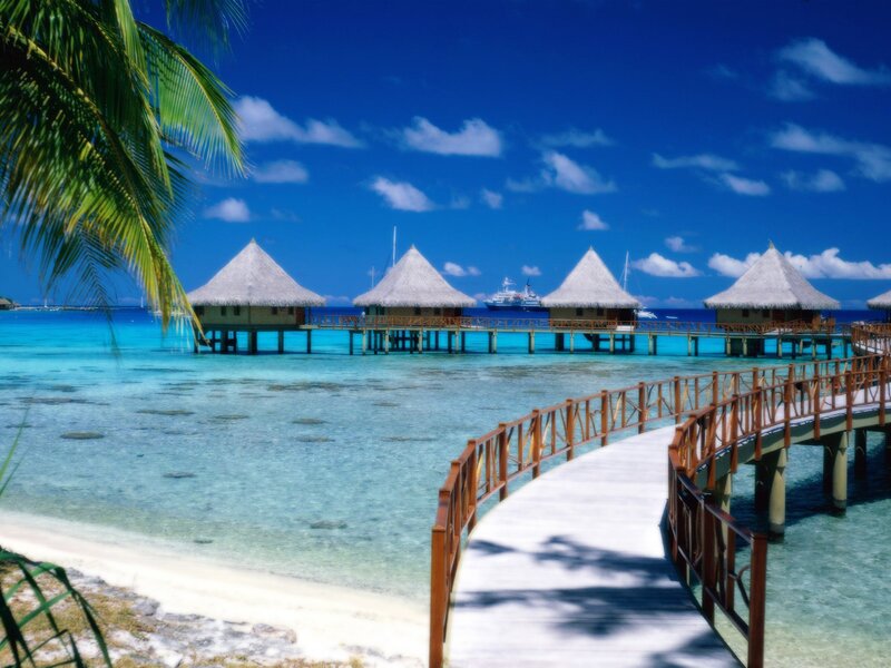 Tropical beach resort with overwater bungalows