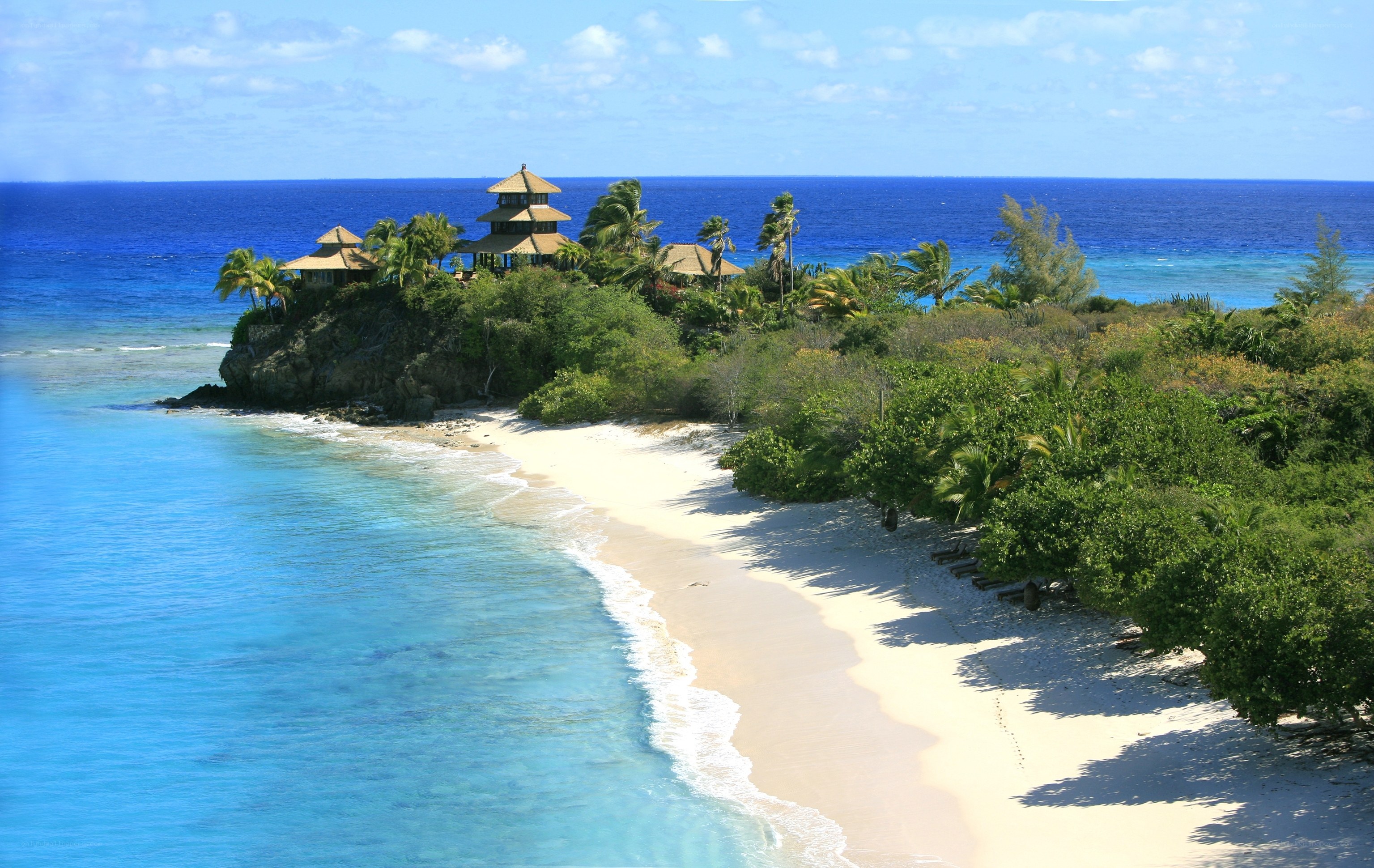 tropical beach resort with pagoda