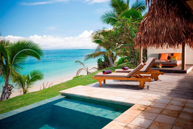 Tropical beach resort with pool