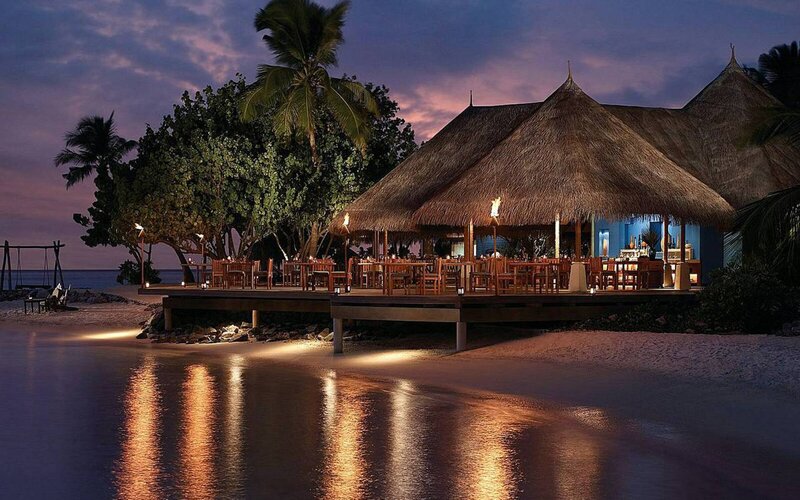 tropical beach restaurant at dusk
