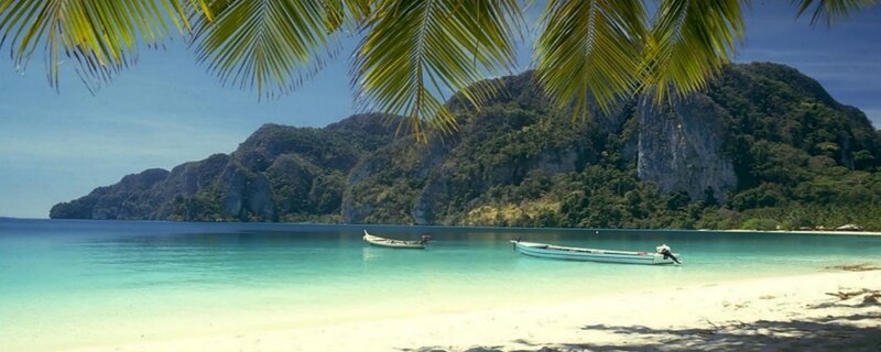 Tropical Beach with Boats — Blue, Serene, Afternoon, Photograph, Palm Trees, Mountain