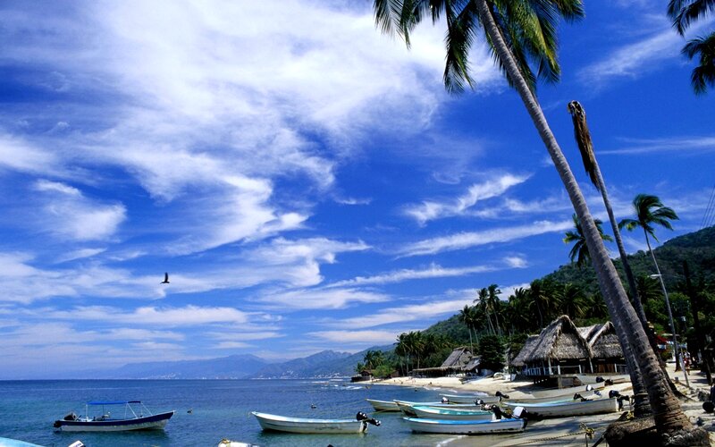Tropical Beach with Boats — Blue, Serene, Afternoon