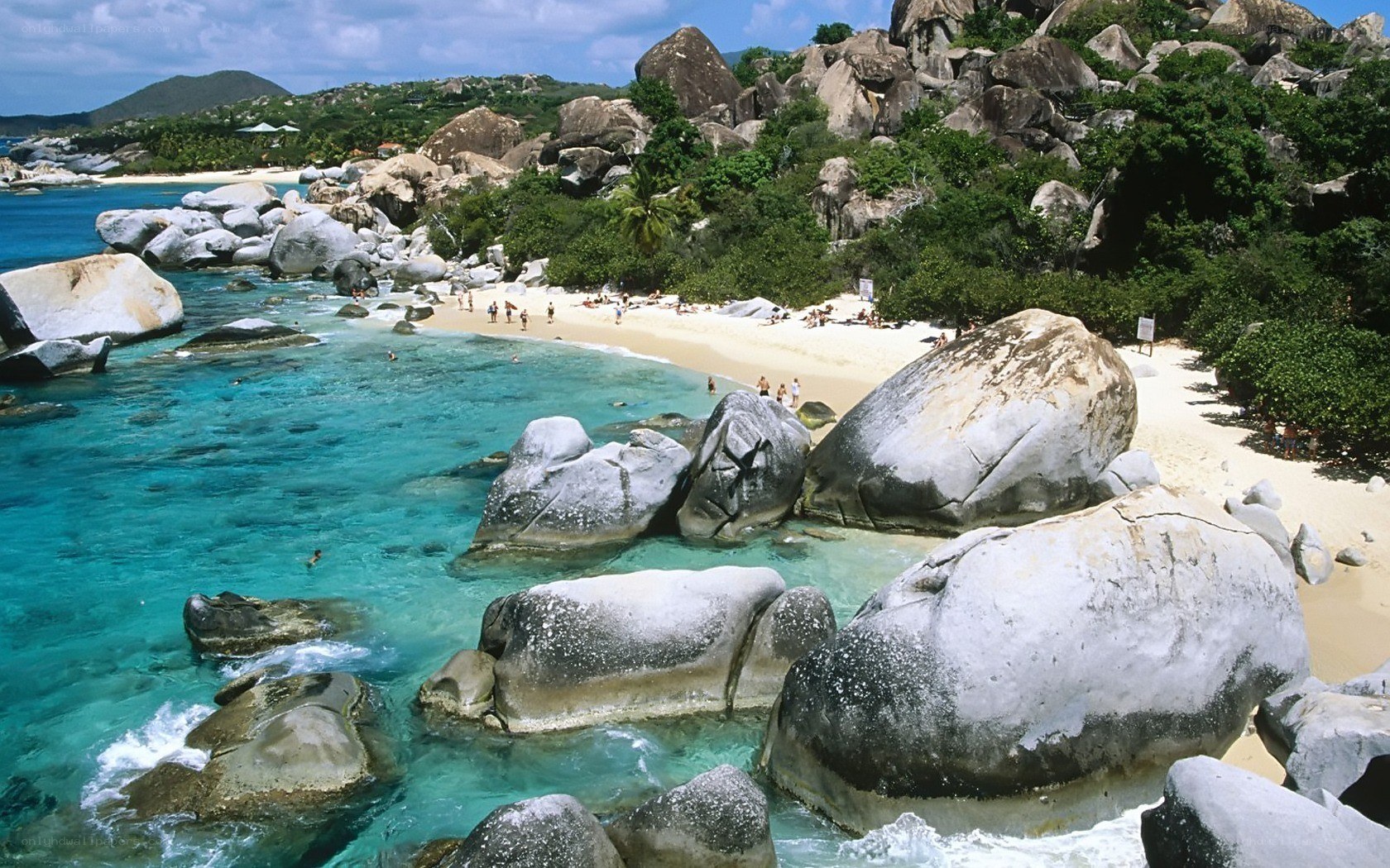 tropical beach with boulders