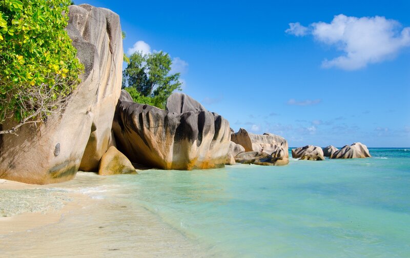 Tropical Beach with Boulders — Blue, Serene, Afternoon, Photograph, Trees