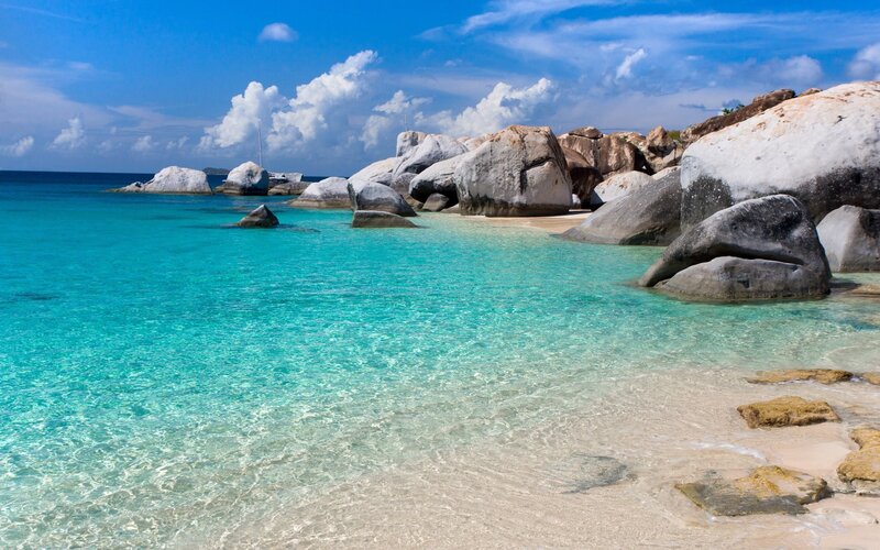 Tropical Beach with Boulders — Blue, Serene, Afternoon