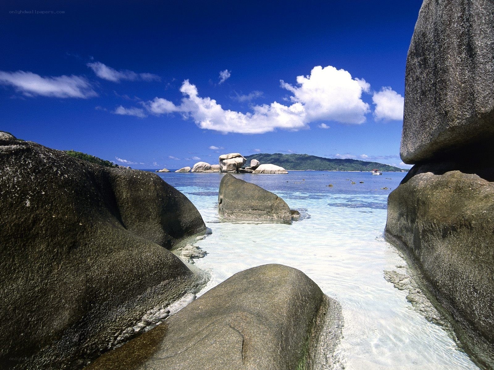 tropical beach with boulders