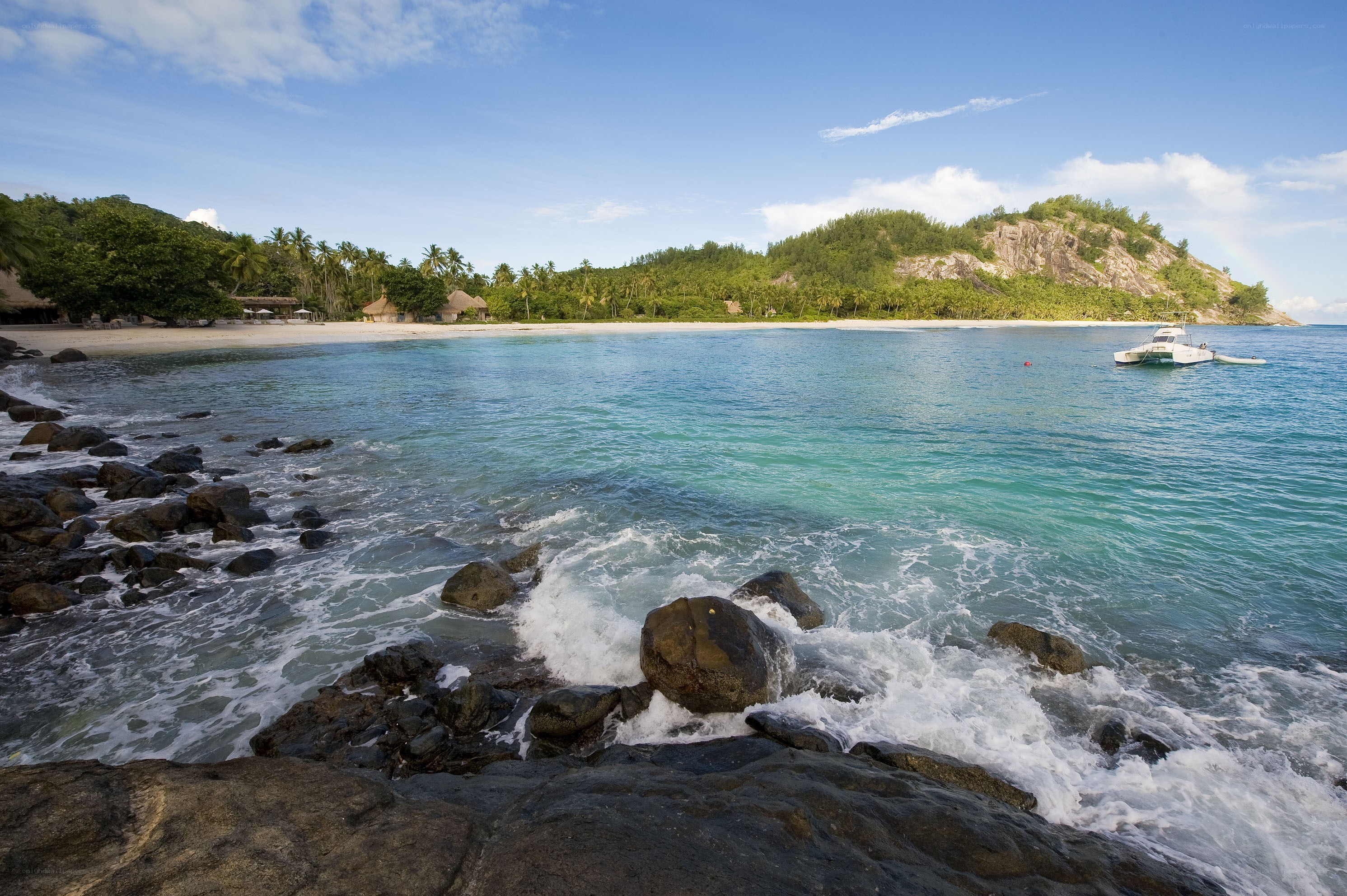 tropical beach with catamaran