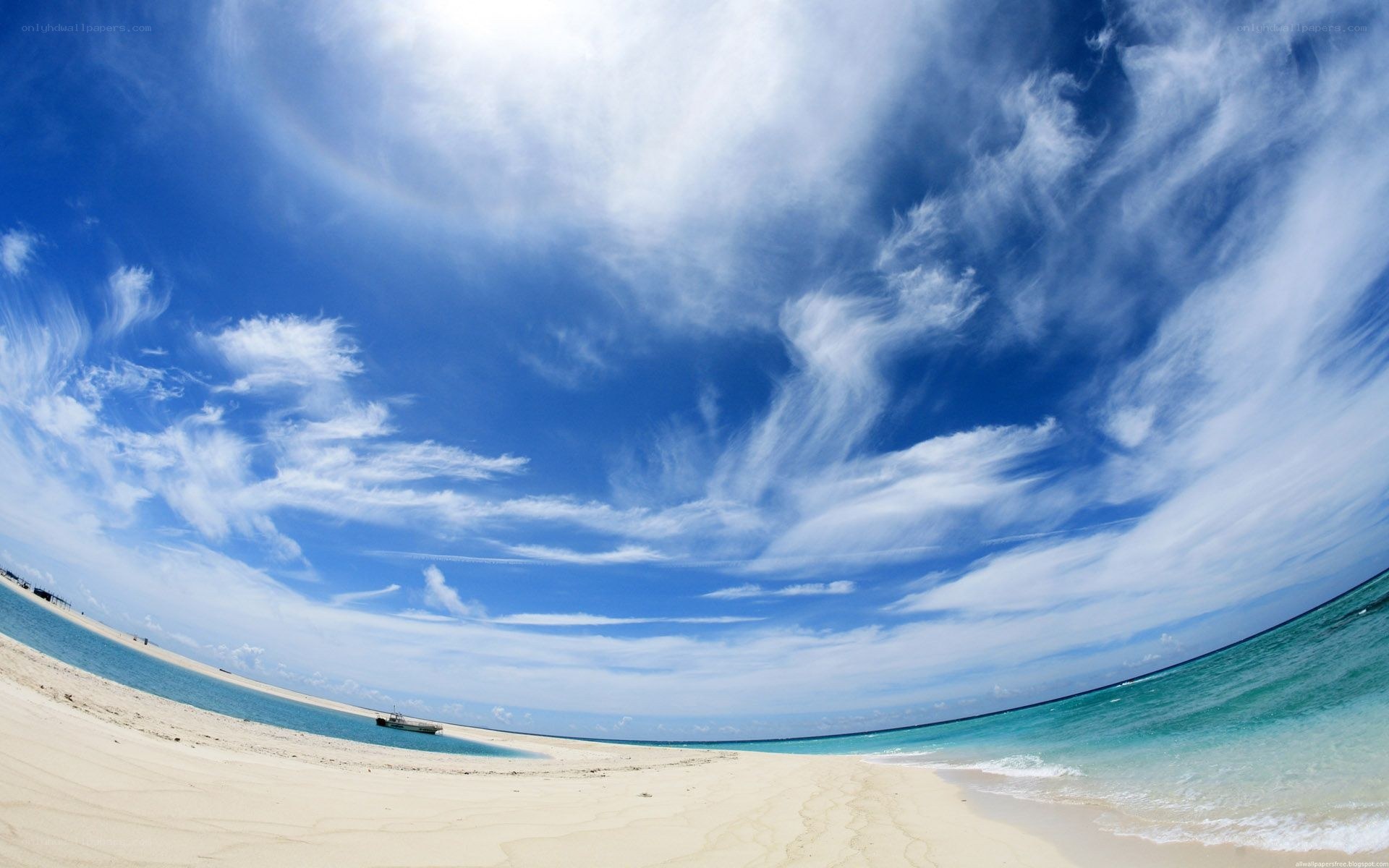 tropical beach with cirrus clouds