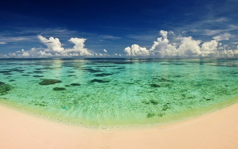 Tropical Beach with Clear Water — Blue, Serene, Afternoon, Photograph, Sand, Ocean, Clouds