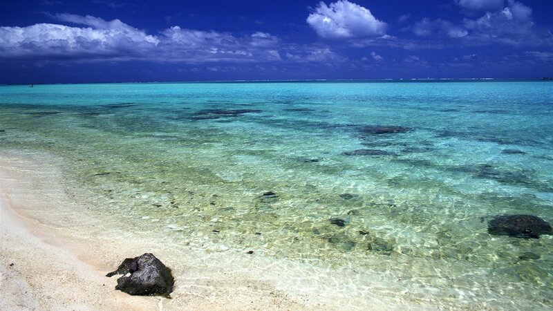 Tropical Beach with Clear Water — Blue, Serene, Afternoon, Photograph, Sand, Rocks