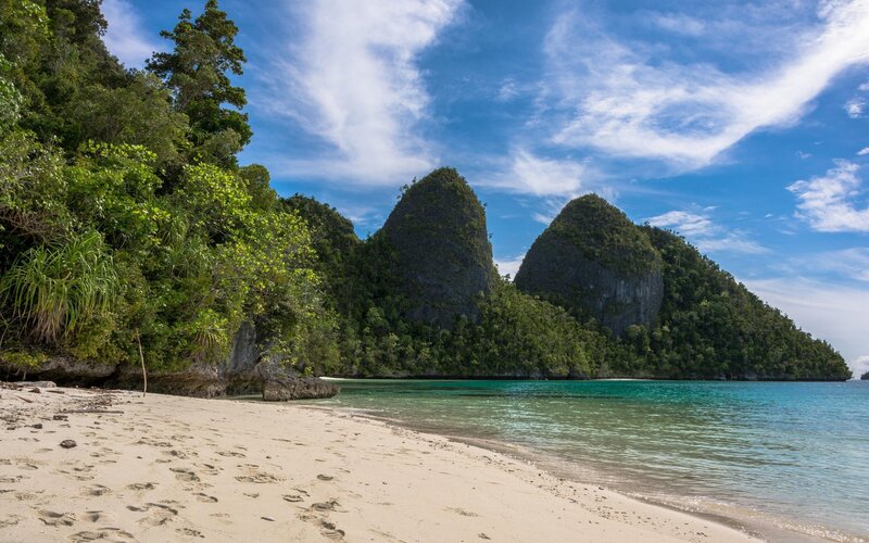 Tropical Beach with Cliffs — Blue, Serene, Afternoon