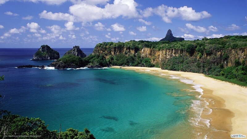 tropical beach with cliffs