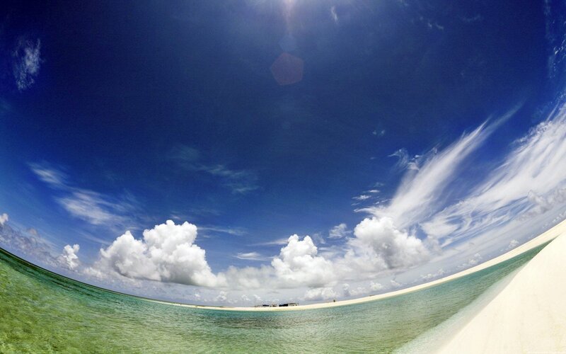 Tropical Beach with Clouds