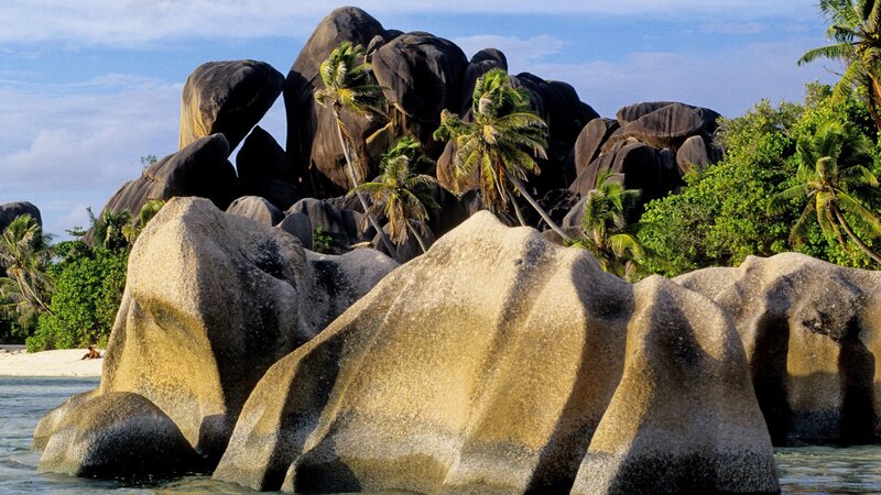 tropical beach with giant boulders