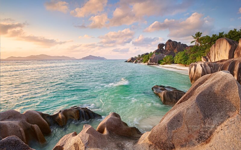 tropical beach with giant boulders