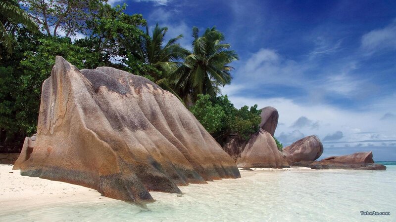 tropical beach with giant boulders