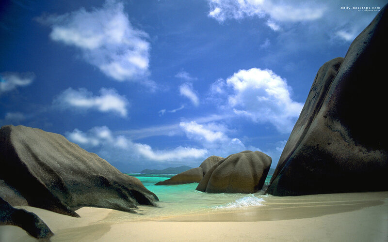 tropical beach with giant boulders