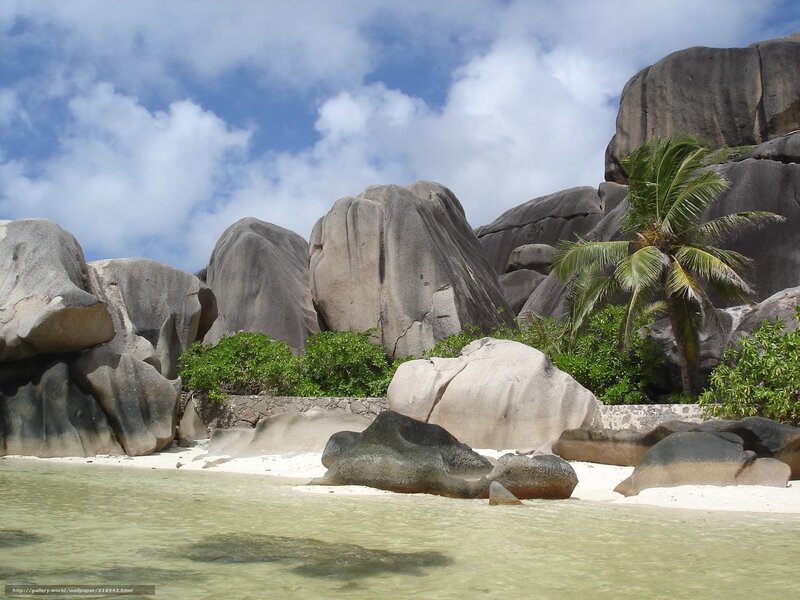tropical beach with giant boulders