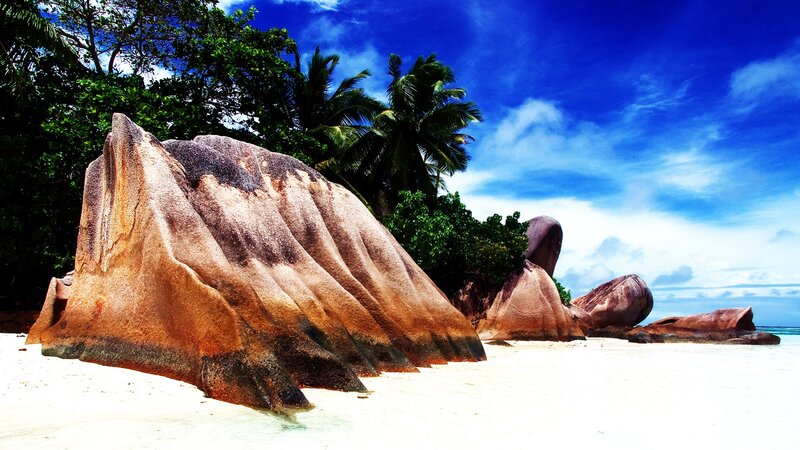 tropical beach with giant boulders