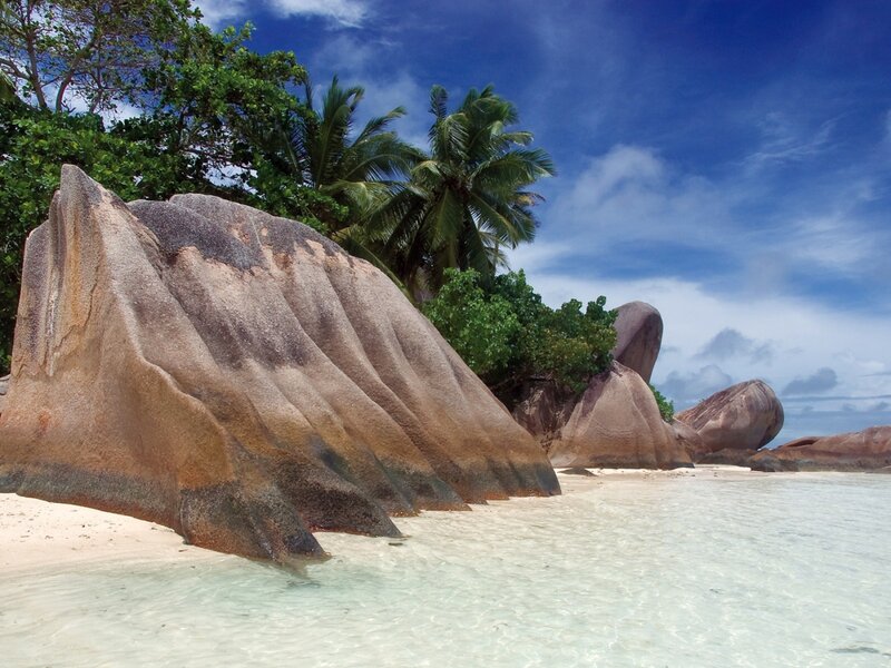 tropical beach with giant boulders