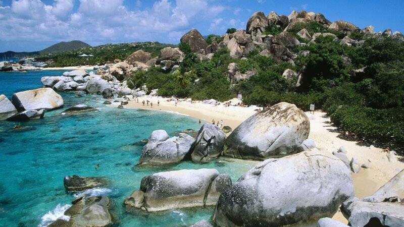 tropical beach with giant boulders