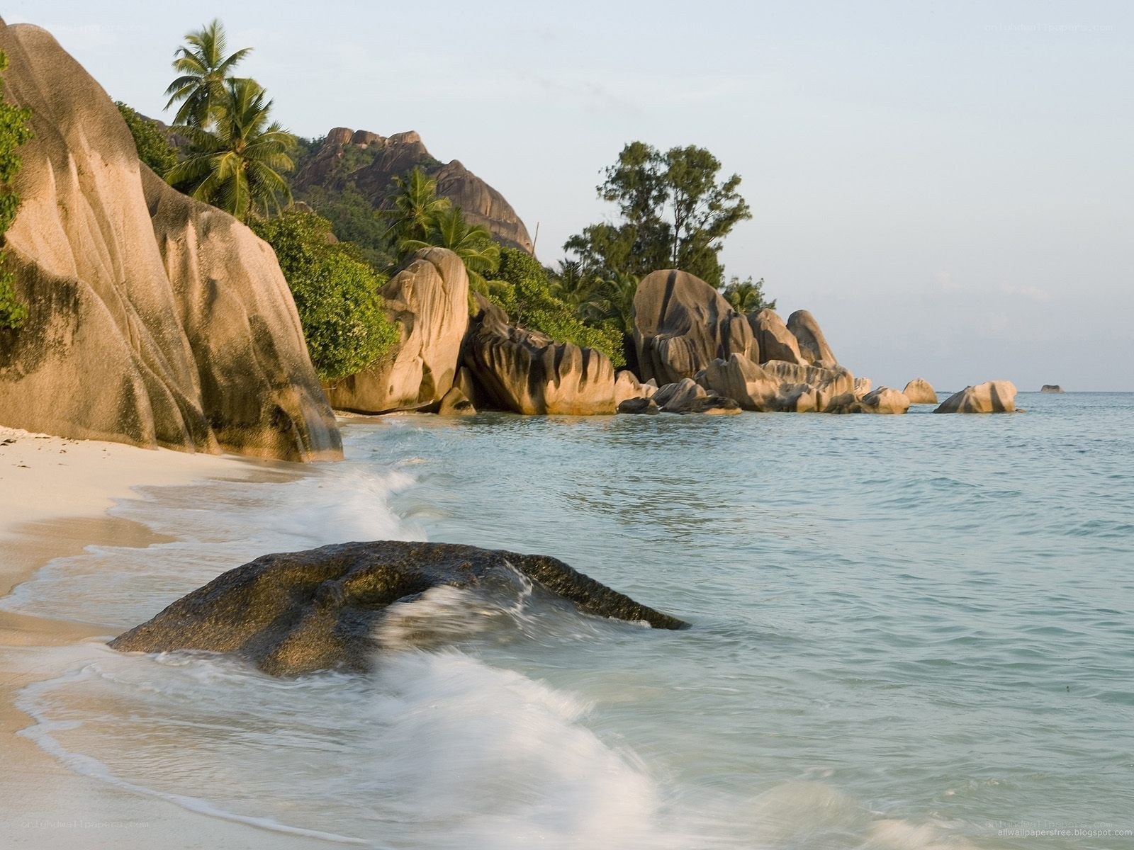 tropical beach with giant rocks