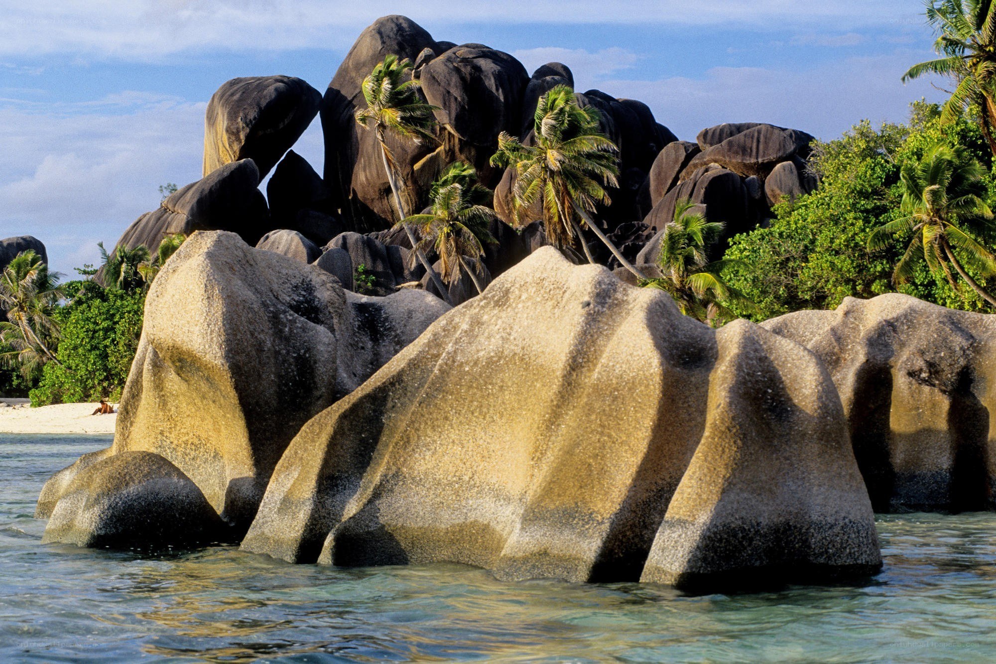 tropical beach with giant rocks