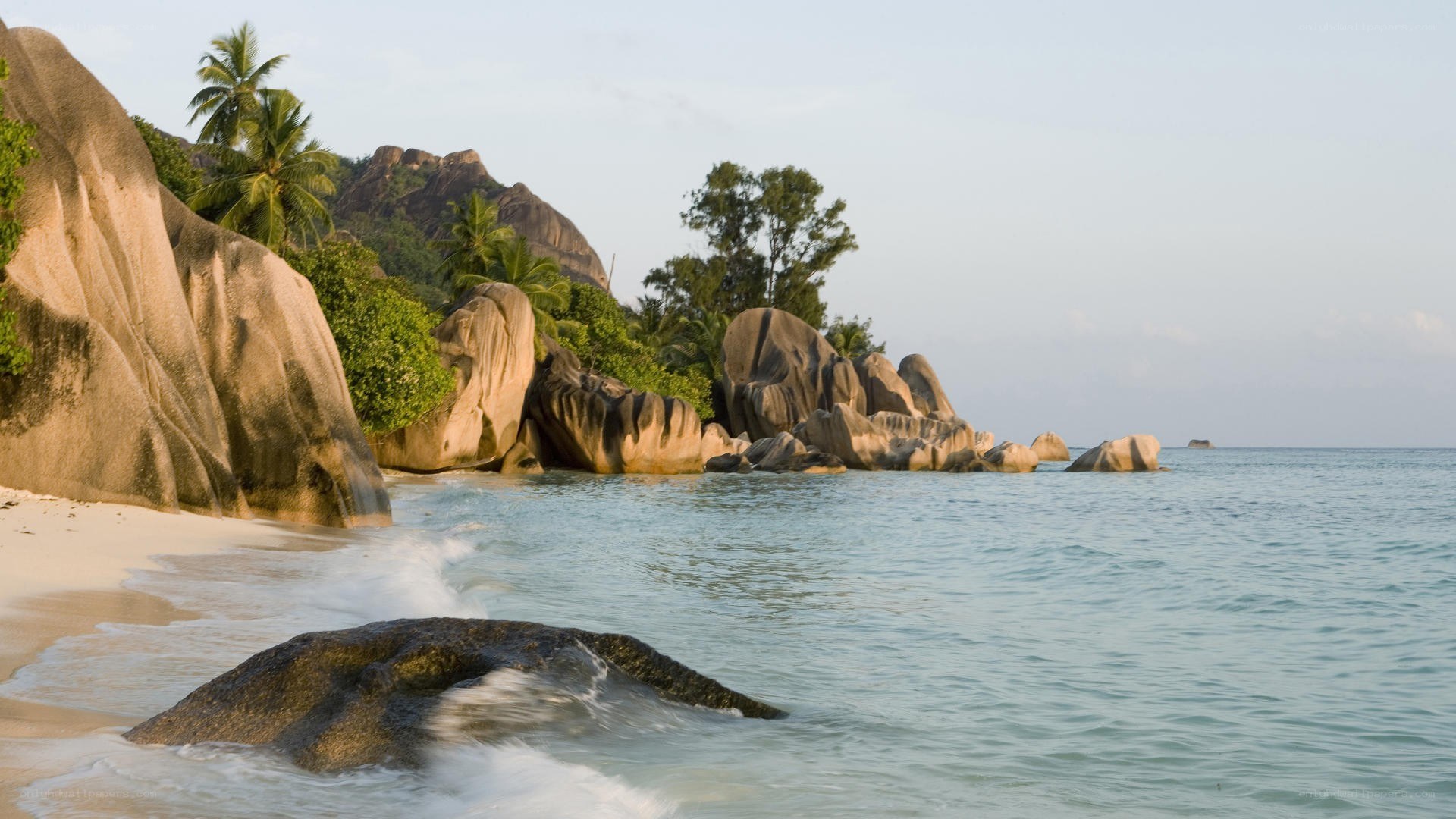 tropical beach with giant rocks