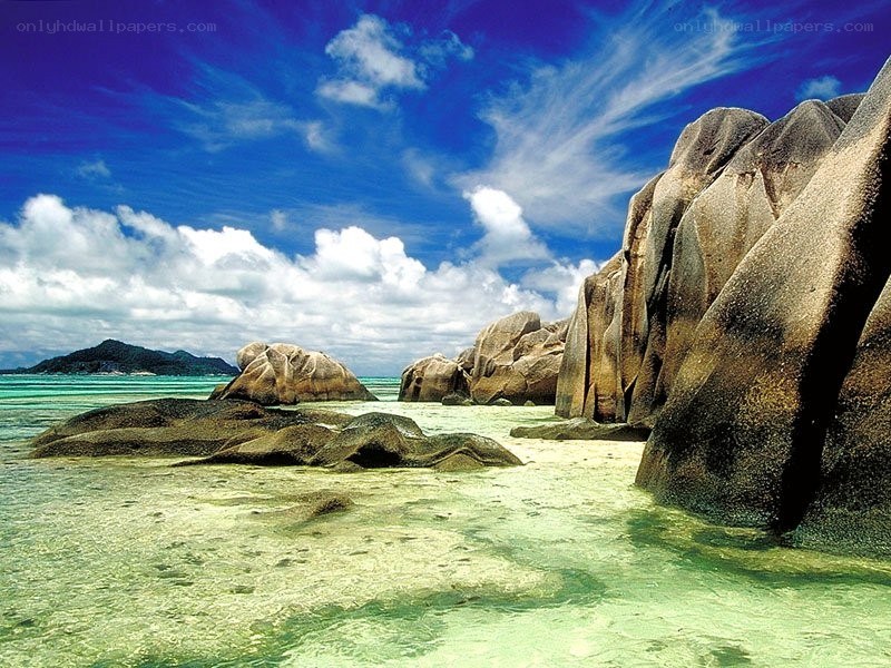 tropical beach with giant rocks